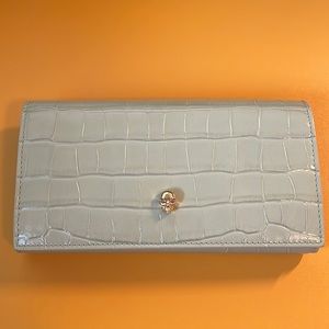 Alexander McQueen croc style wallet in green.